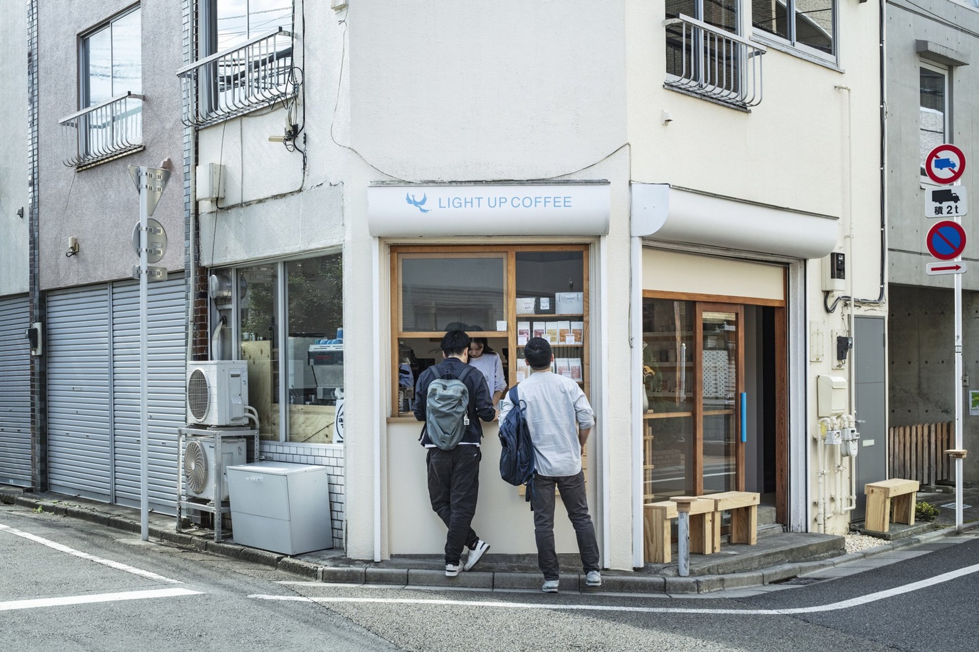 Spicy Architects Carves a Wedge-Shaped Coffee Shop into a Shimokitazawa Corner