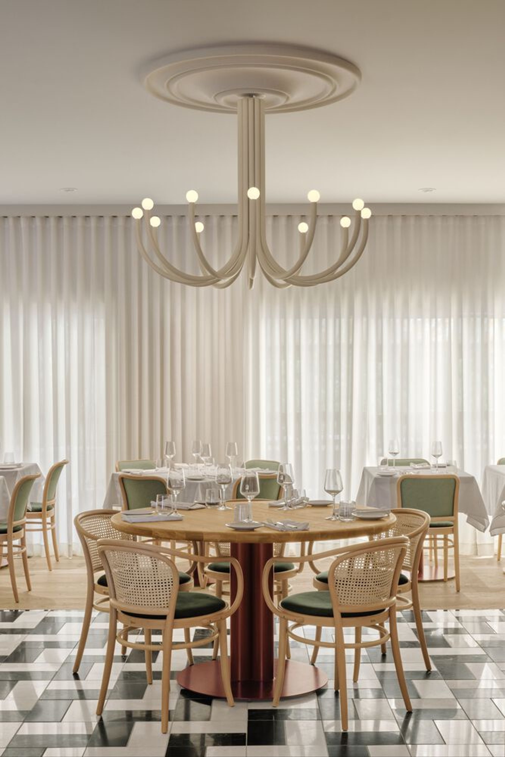 Ivy Studio Lines a Montreal Italian Restaurant with Stone, Marble, and Fluted Glass