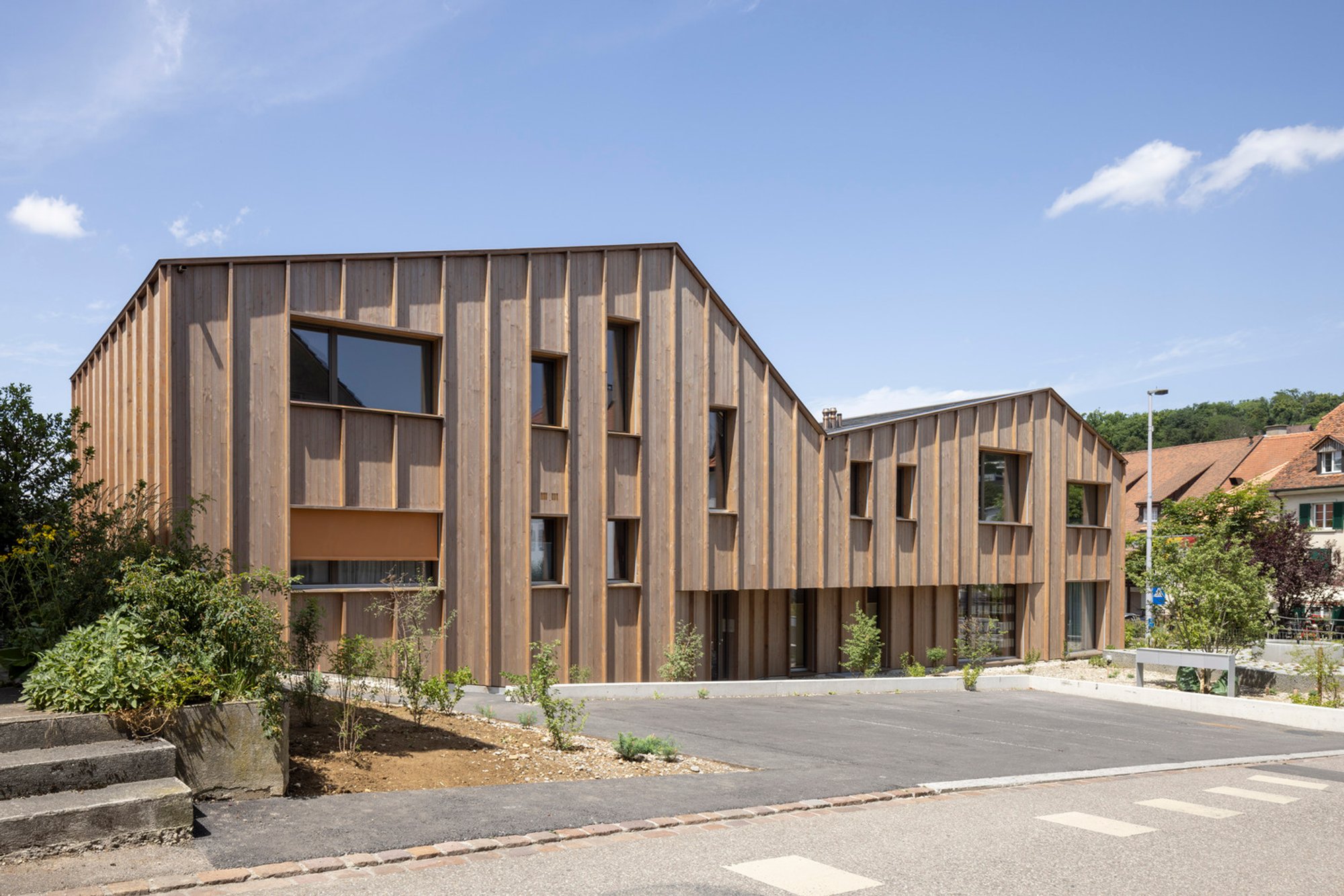Sustainable Wooden Architecture in Residential Buildings: Beck Oser Architekten's Replacement Buildings in Elgg