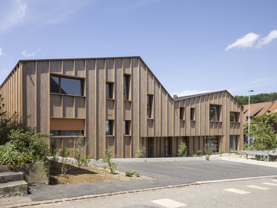 Beck Oser Architekten Replaces an Old Carpentry Workshop with Timber Housing in Elgg