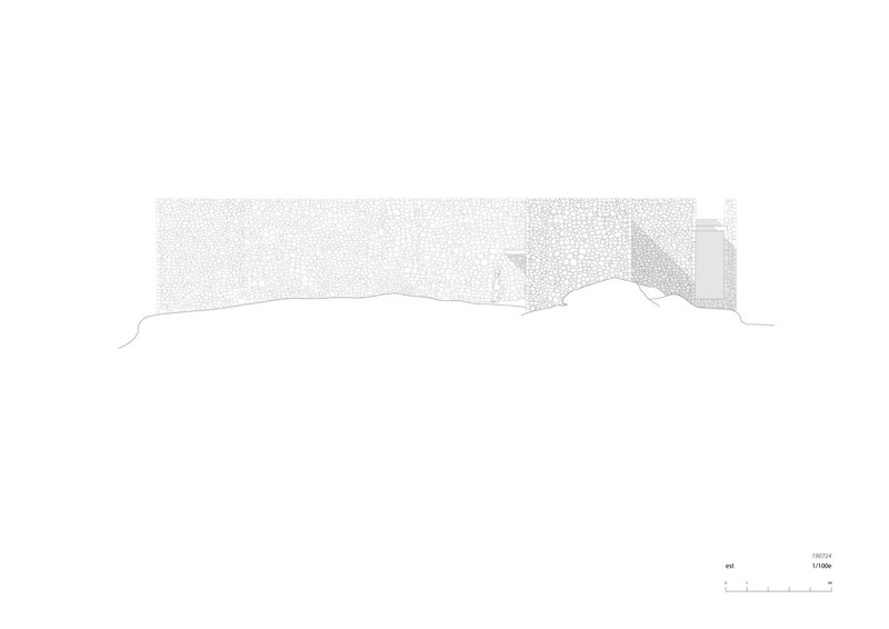 Elevation drawing showing a long horizontal facade with textured stone cladding following the sloping ground line