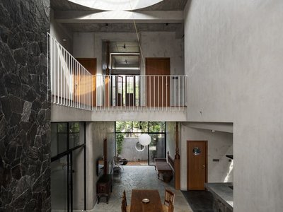 TAB Wraps a Geoffrey Bawa-Inspired Family Home in Ribbed Metal Cylinders in Kochi