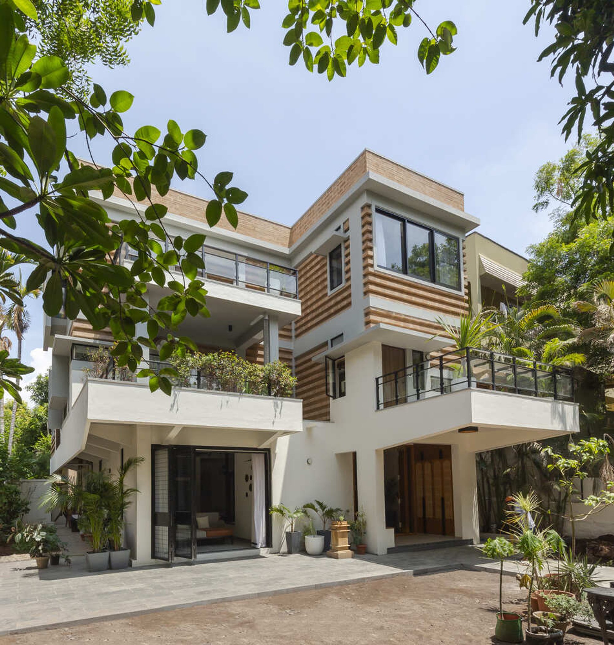 Sustainable Home Renovation: Shruthi and Sunith's House by Biome Environmental Solutions
