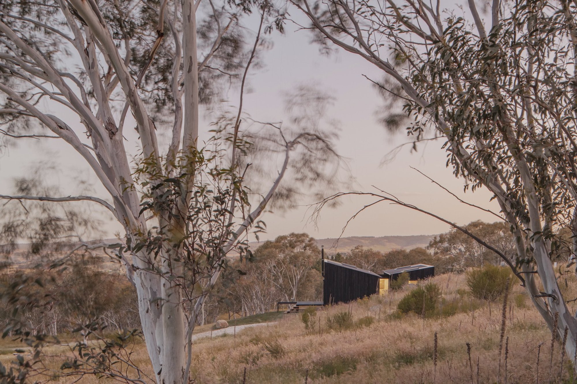 Alan Powell Studio Drops Two Charred Timber Pods into the Australian Alps