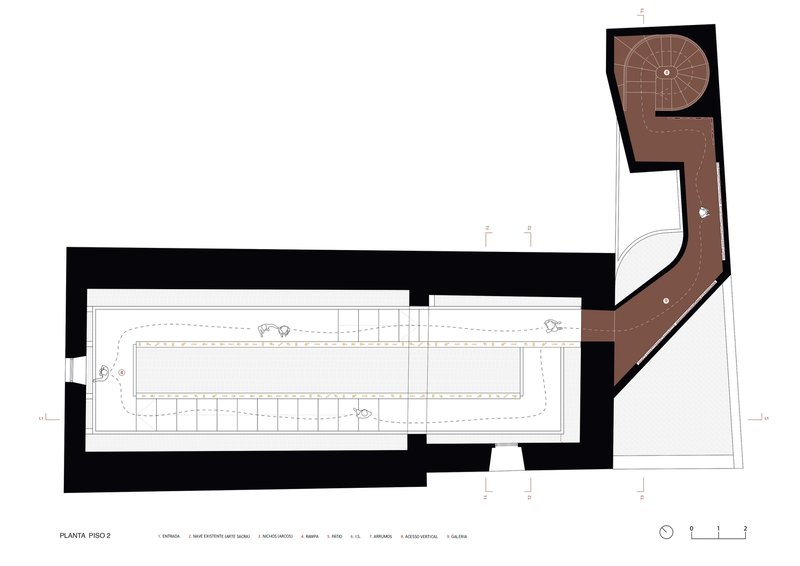 Floor plan showing the second level with expanded tower spaces and a spiral stair above