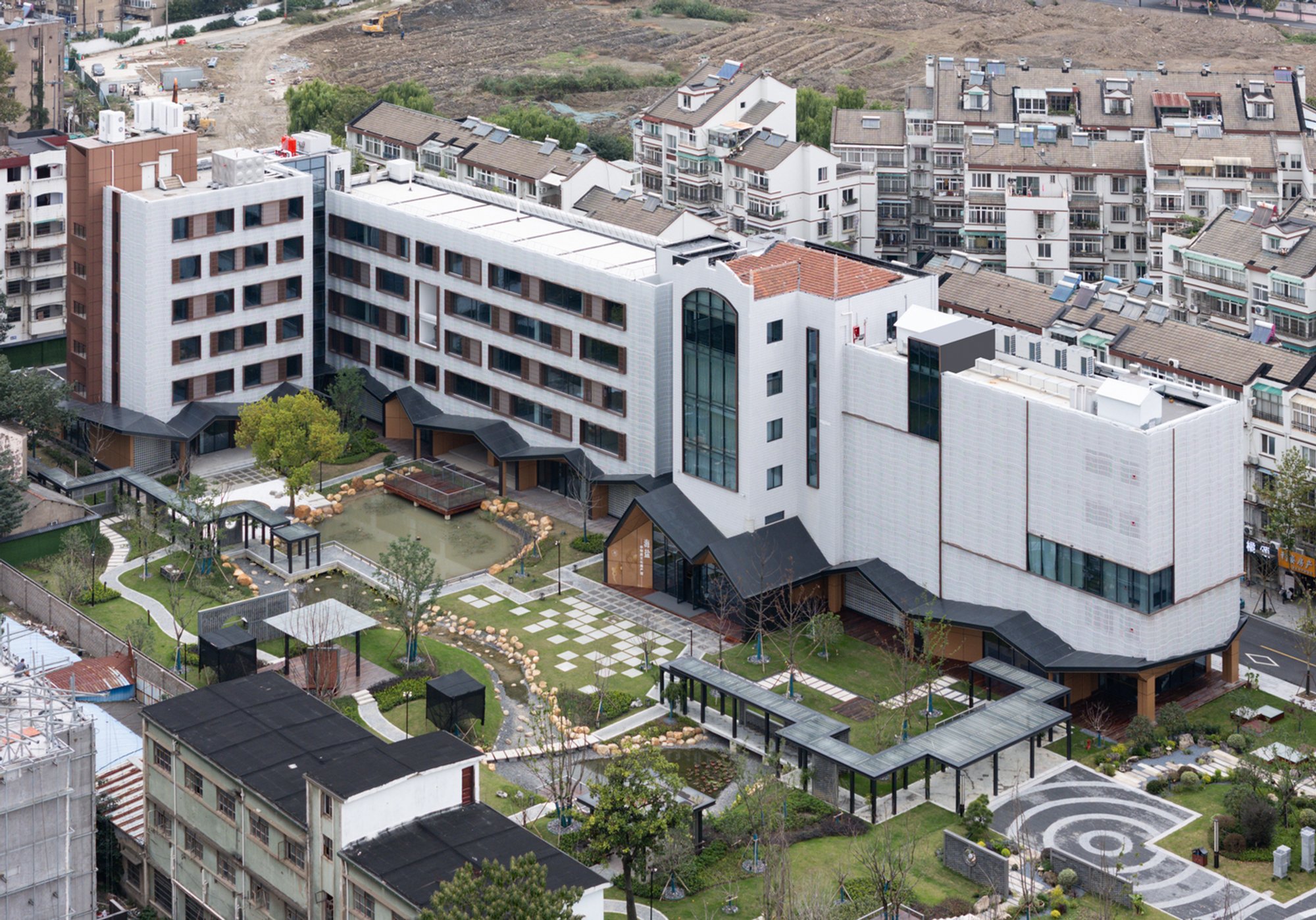 Cultural Heritage Museum Architecture: Haiyan Intangible Cultural Heritage Museum by LYCS Architecture