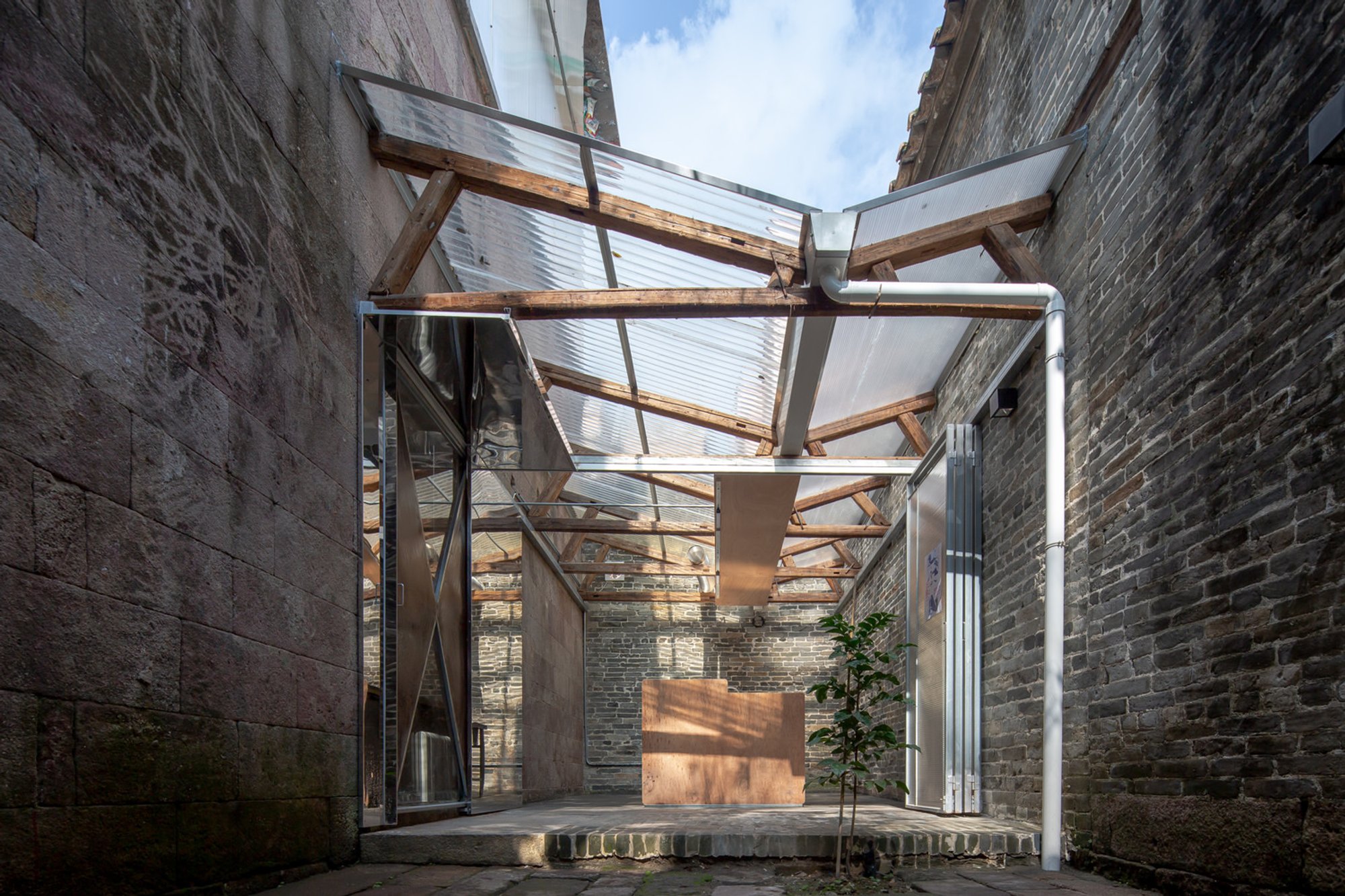 NEME Studio Turns an Abandoned Qing Dynasty Pawnshop into a Village Commons in Bijiang