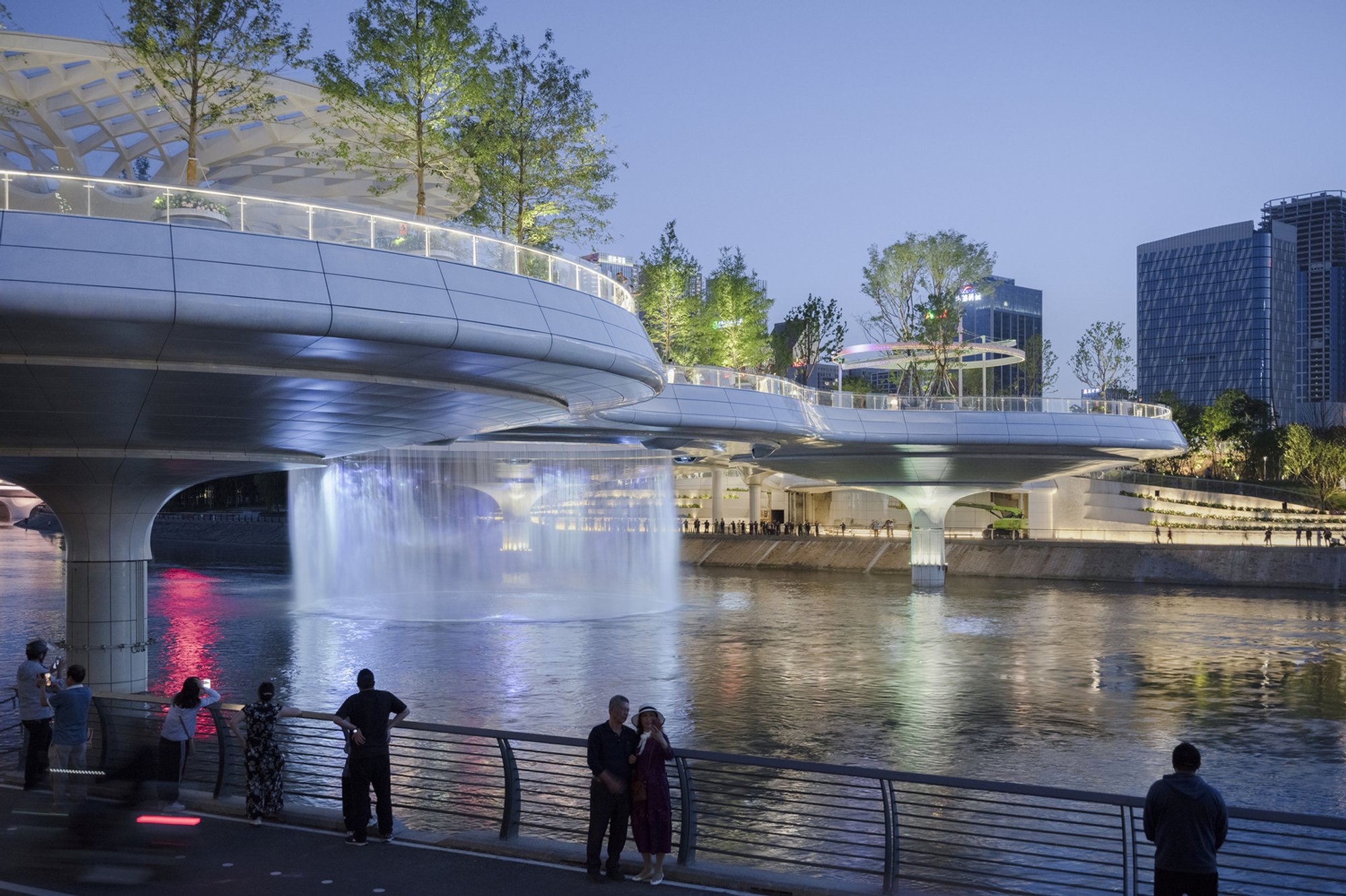 China Southwest Architectural Design Floats a 498-Meter Lotus-Leaf Park Over Chengdu's Jinjiang River