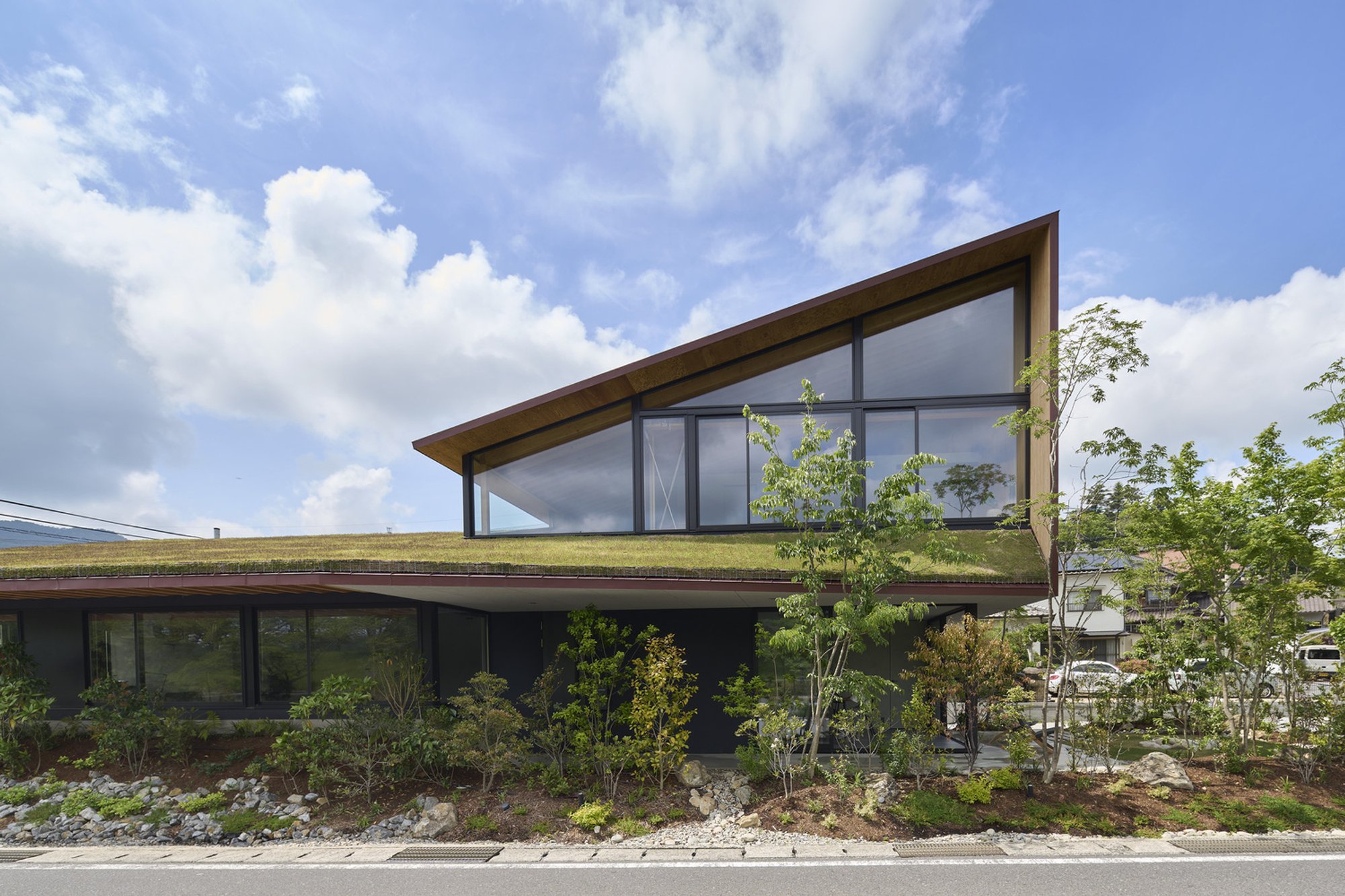 HAYATO KOMATSU ARCHITECTS Roots a Grass-Roofed Community Hub in the Mountains of Hiroshima