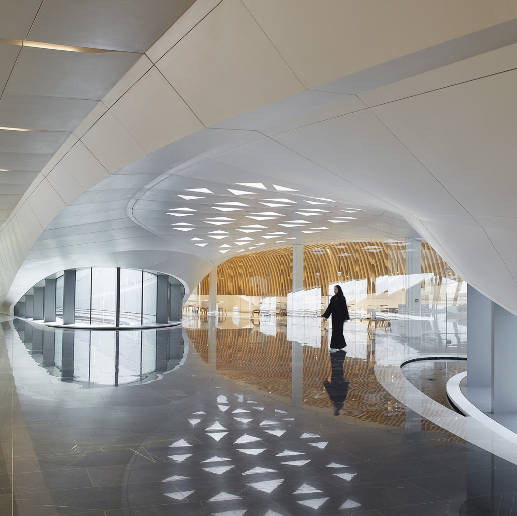 Zaha Hadid Architects Shapes a Desert Headquarters from Sand Dune Logic in Sharjah