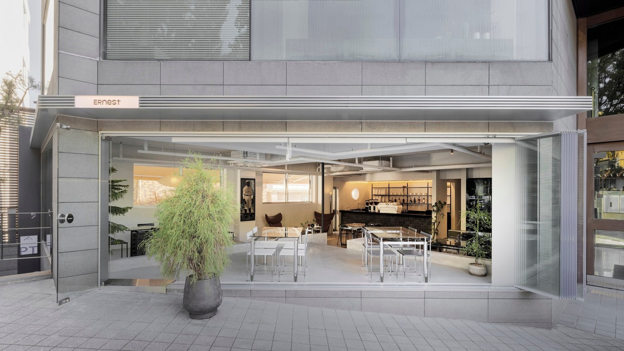 Ernest Café and Wine Bar by Orosy Studio: A Seamless Fusion of Day and Night