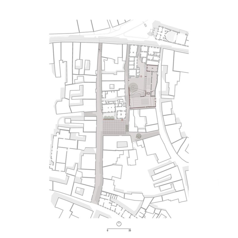 Ground floor plan drawing depicting a linear building complex with courtyards inserted between existing urban structures