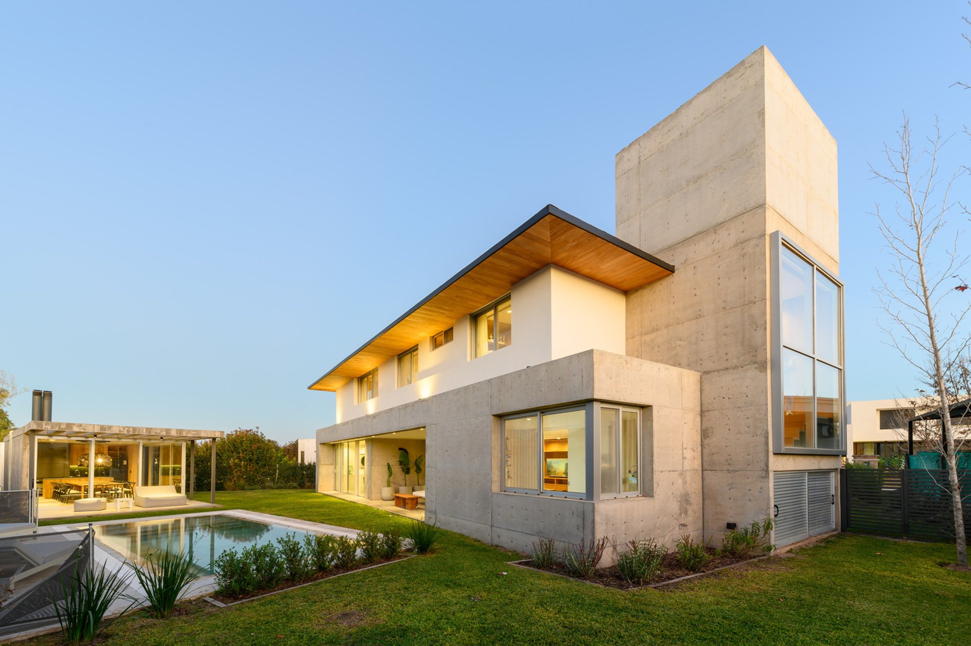 Estudio Opaco Wraps a Córdoba Family Home in Wooden Lattice and Concrete Calm
