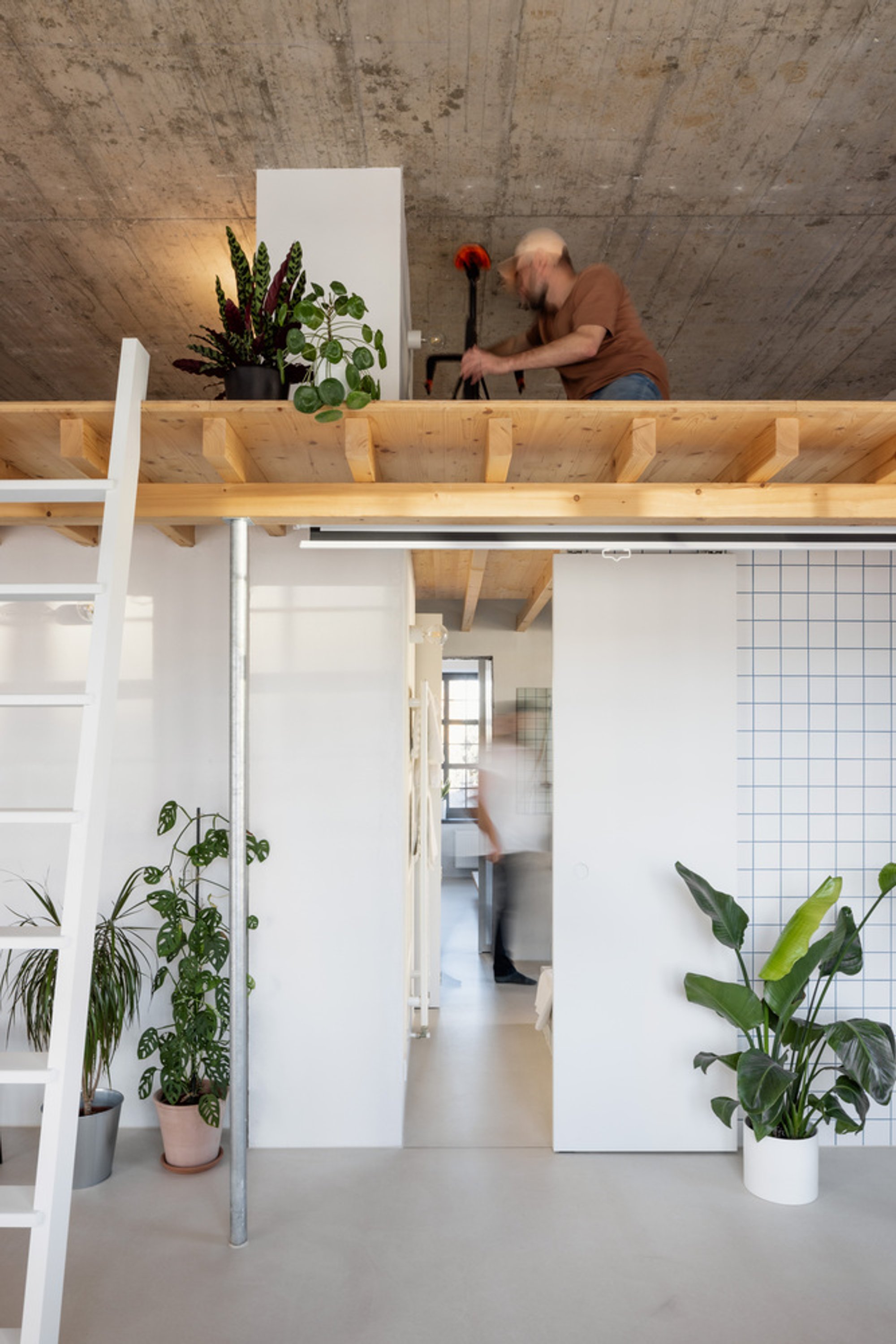 Kilo / Honc Carves a Landscape of In-Between Spaces from an 80 m² Slovak Apartment