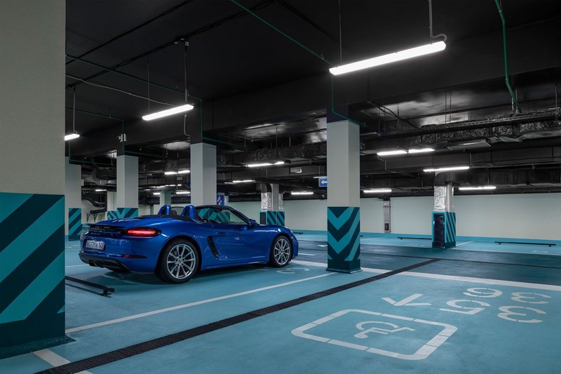Luxury meets functionality: A sleek underground parking space at Reef Residence Sochi, designed for convenience, aesthetics, and efficiency.