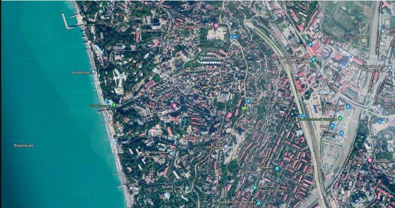 Aerial view of Sochi: Showcasing the urban fabric, coastal infrastructure, and integration of smart architectural developments.
