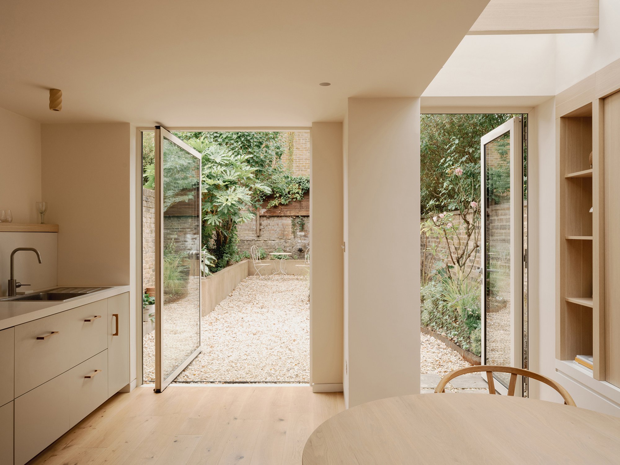 Studio 163 Architects Turns a Dark London Flat into a Clay-Clad Garden Home