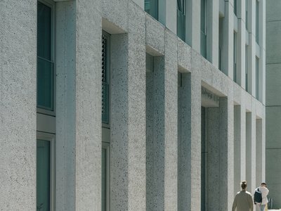 BETA Stacks 95 Apartments and Three Communal Lounges into a Concrete Tower on Amsterdam's Last Shipyard