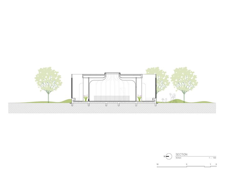Section drawing revealing interior courtyard with curved ceiling vaults and central planted area