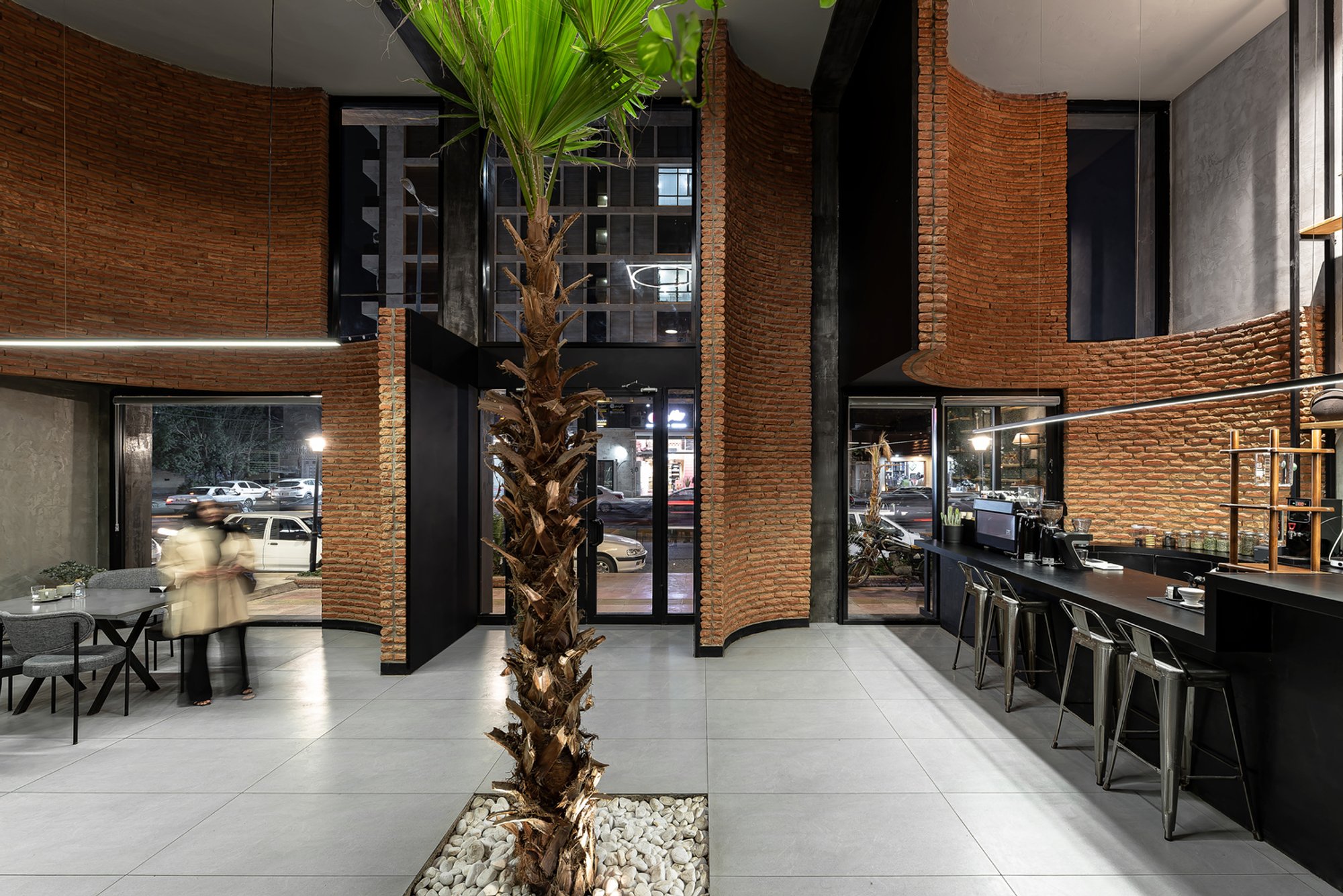 OJAN Design Studio Wraps an Ahvaz Food Hall in Handcrafted Curved Brick Walls