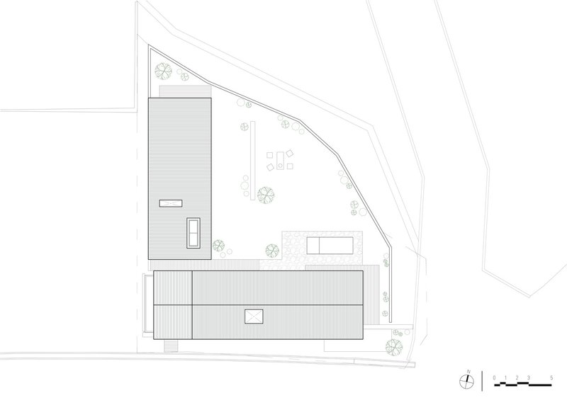 Roof plan drawing depicting the corrugated metal roof volumes and outdoor courtyard spaces