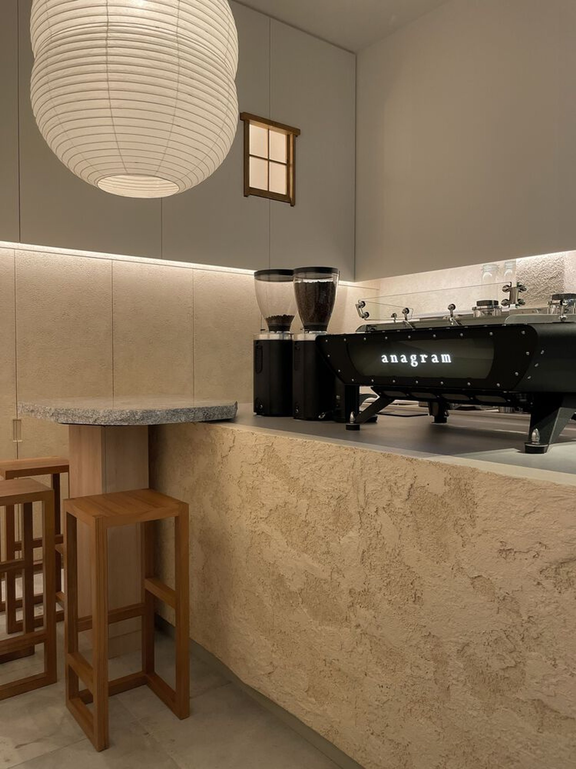 Tristan & Ju Turns a 350-Square-Foot Nook into a Theatrical Coffee Stage in Singapore