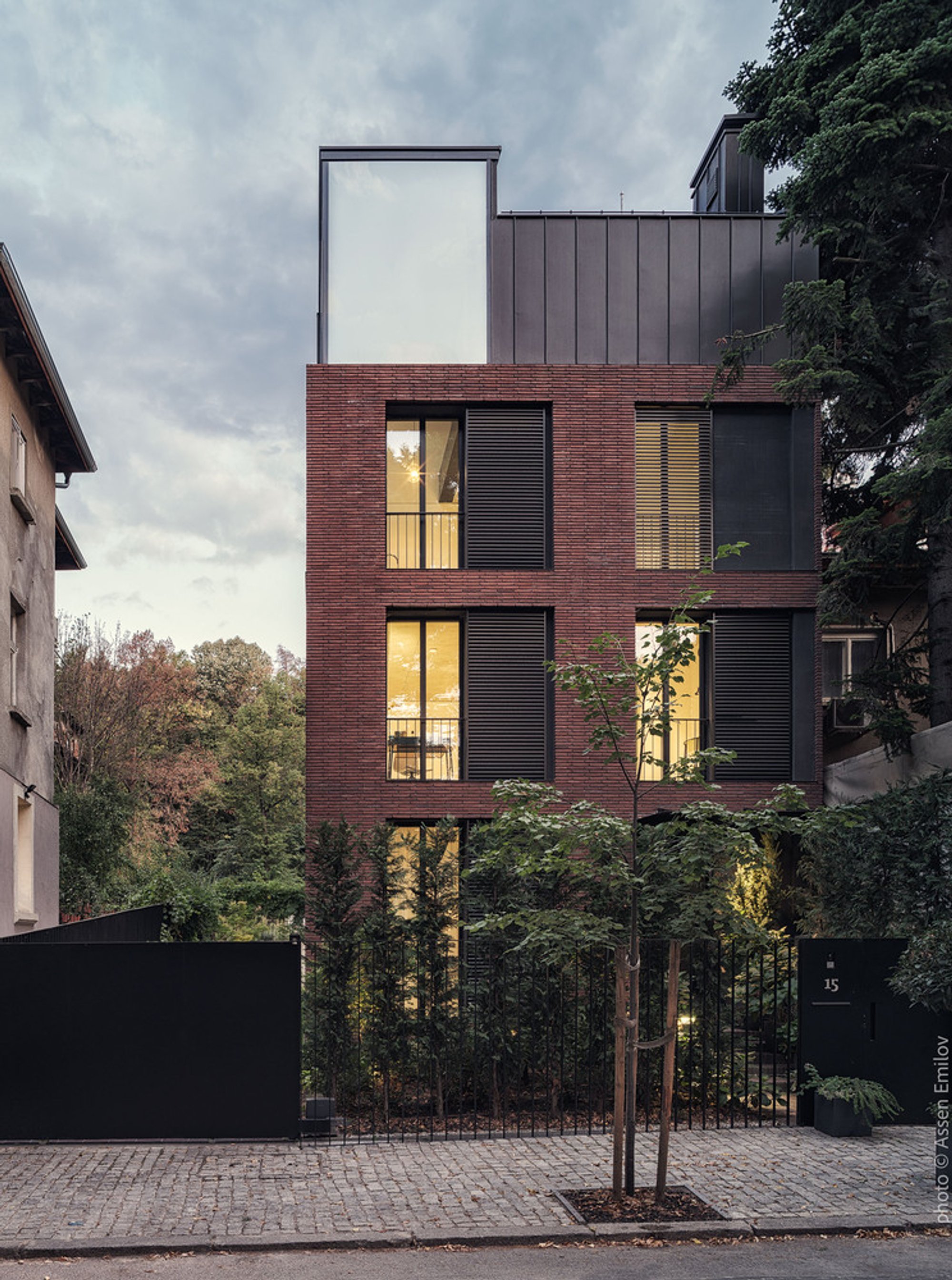I/O Architects Wrap a Four-Storey Sofia Home Around Three Courtyards and a Hydraulic Meadow