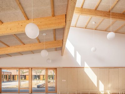 Richter Architectes Builds a Timber Village School Around Double Courtyards in Mitry-Mory