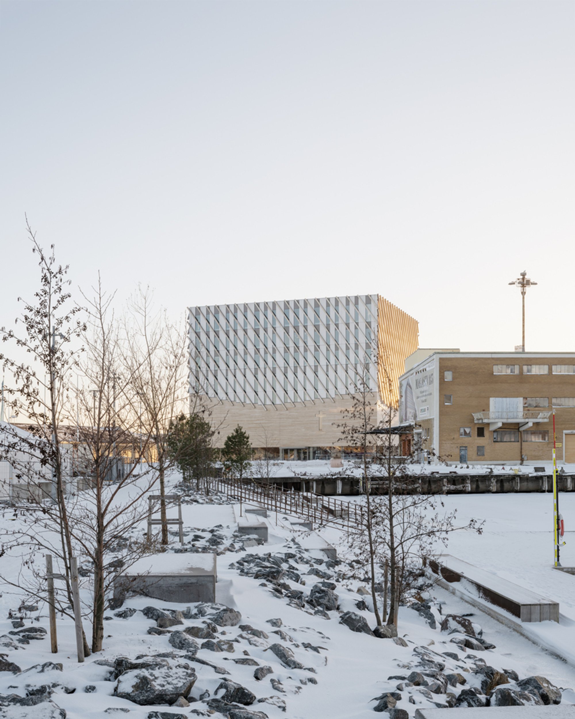 Elding Oscarson Stacks a Civic World atop a Column-Free Church Hall in Gothenburg's Docklands
