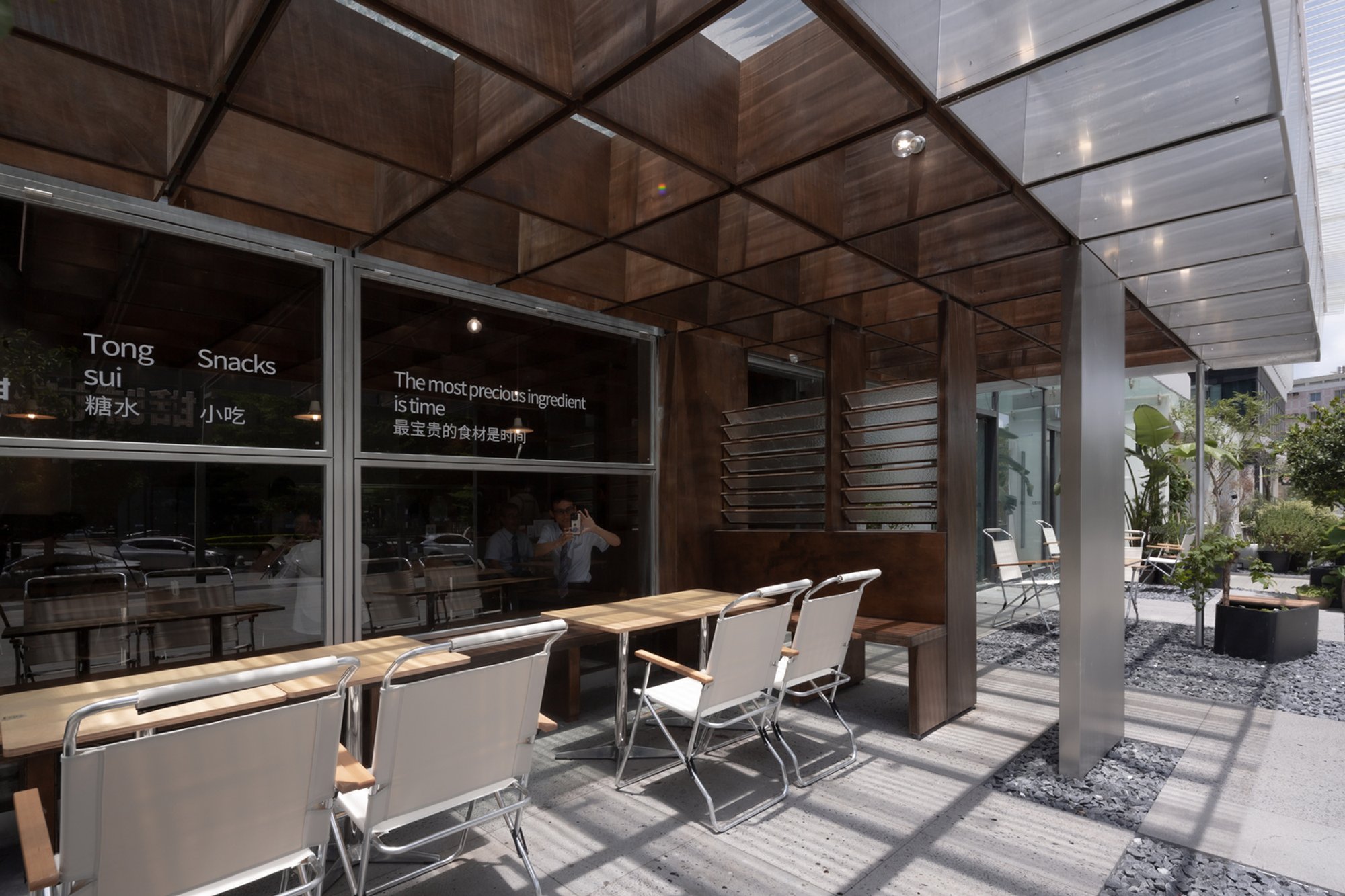 NEMEArchitects Turns a Foshan Dessert Shop into a Sundial That Tracks Time in Dappled Light