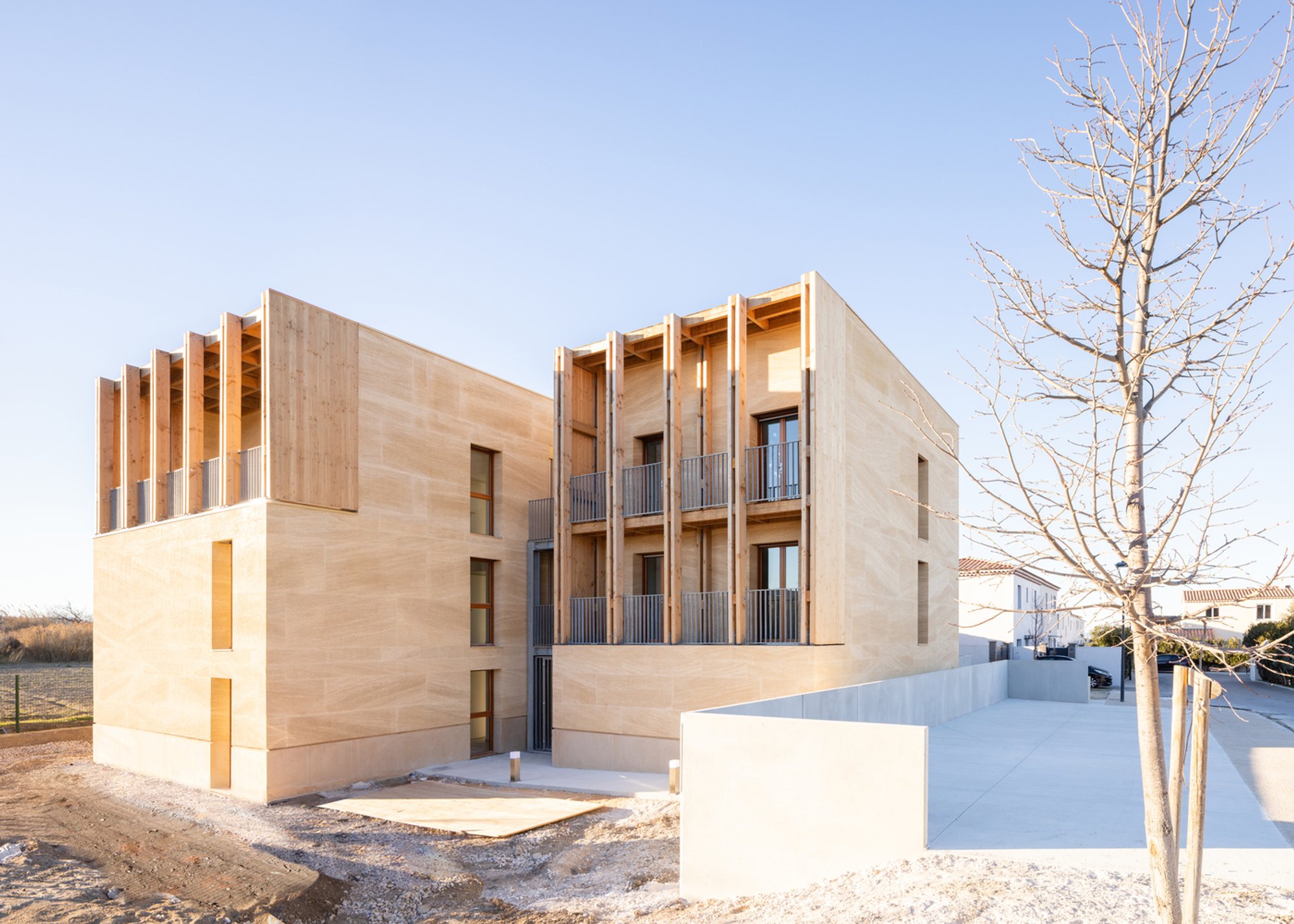 8 Social Housing Units by Atelier Régis Roudil Architectes in Gignac-la-Nerthe, France