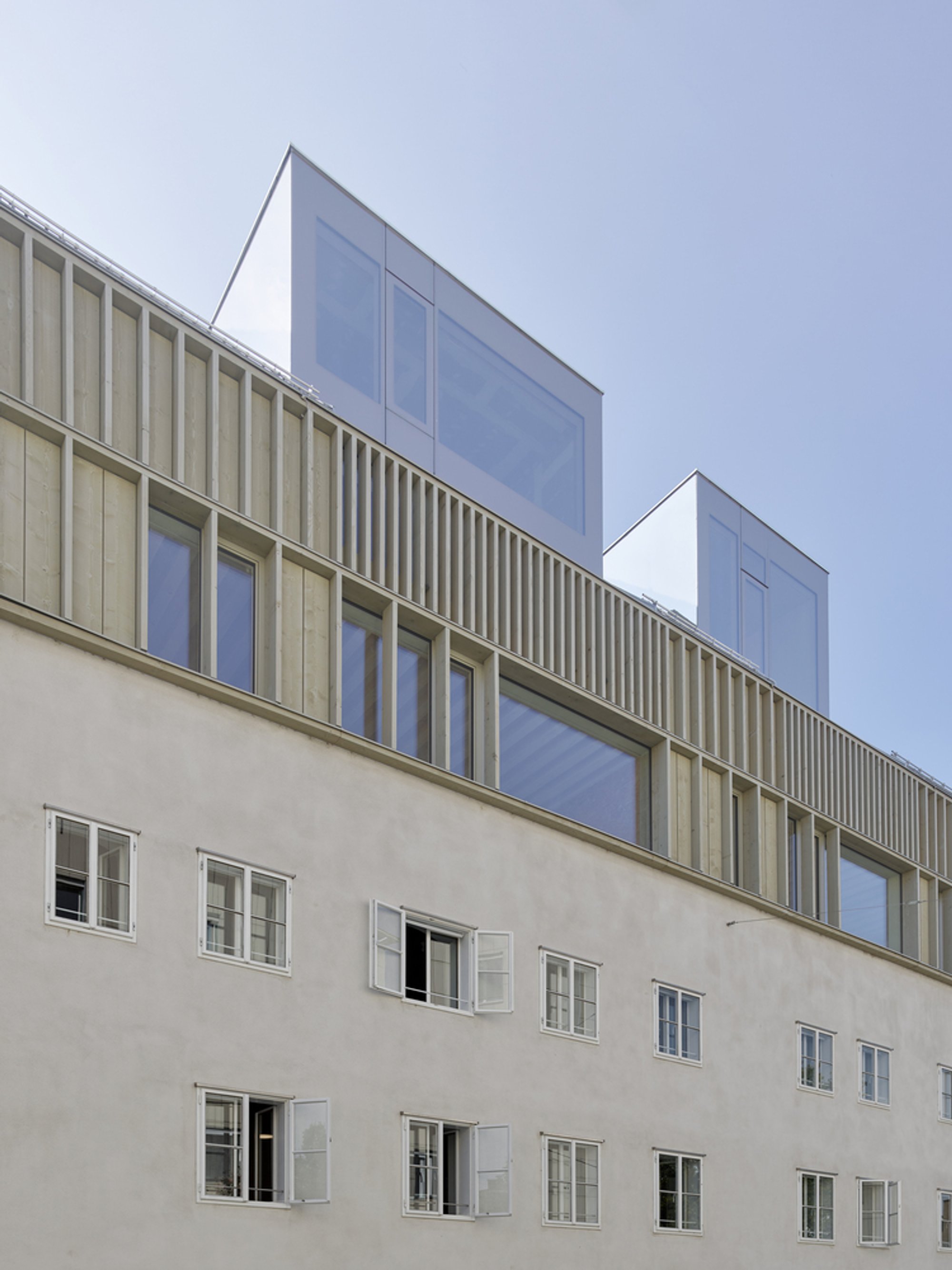 mia2/Architektur Saves a 16th-Century Linz Townhouse with Rammed Earth and Radical Restraint
