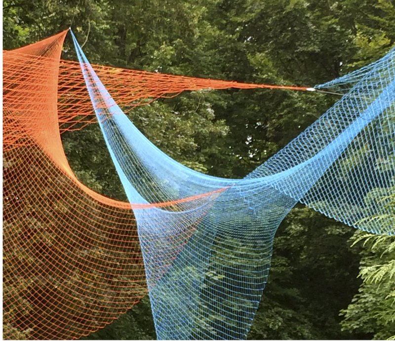 Floating Art: A kinetic installation blending colors and movement in urban spaces.