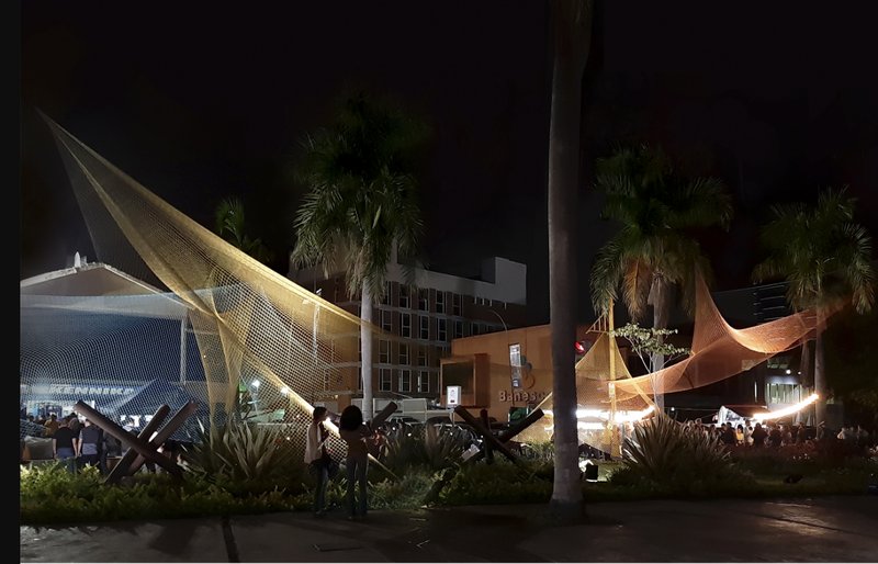 Suspended Beauty: A delicate balance of form and motion in a serene park.