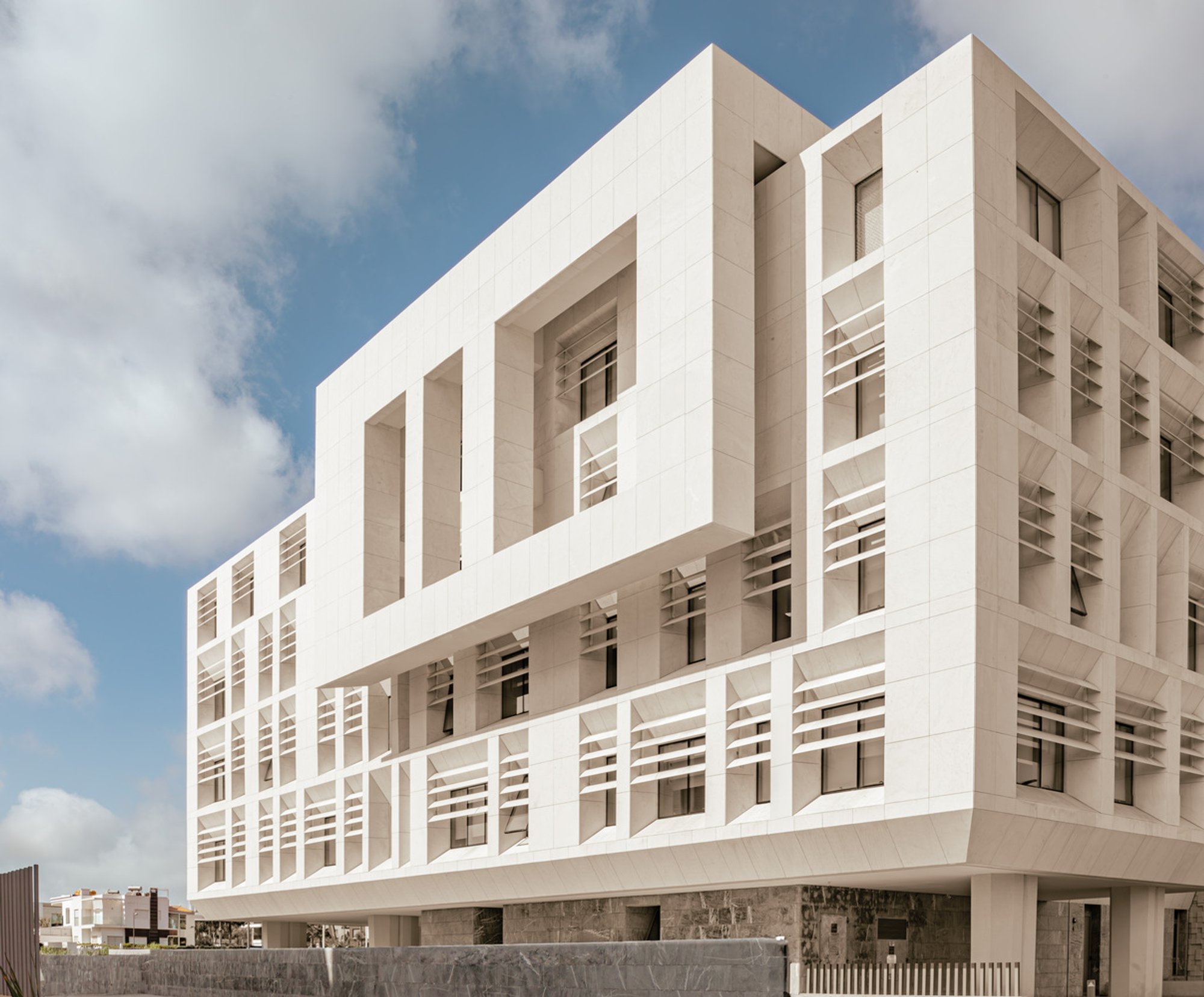 PRISM Architecture and KD Architecture Wrap Rabat's Competition Council in Layered Stone and Symbolism
