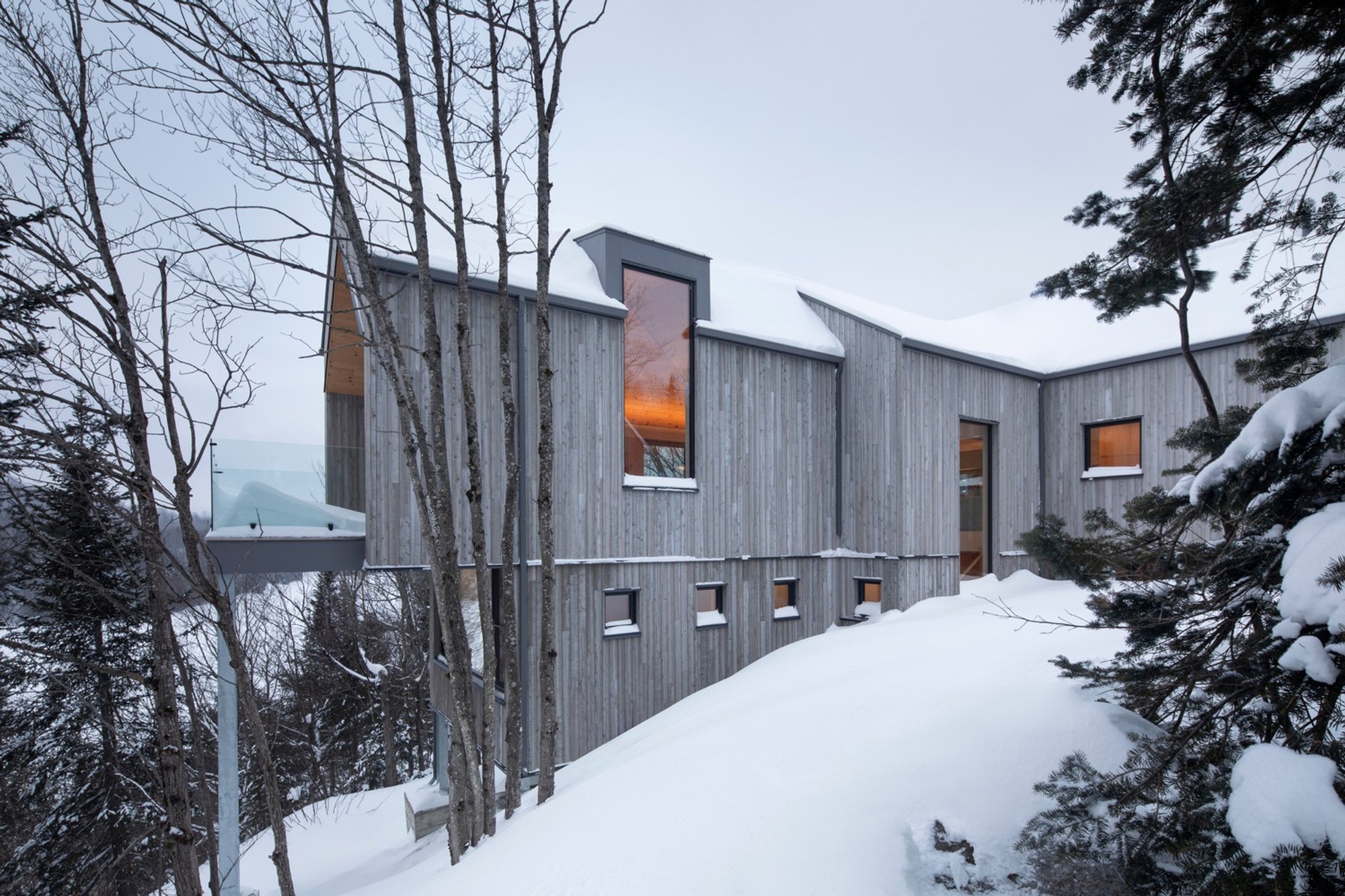 Eco-Friendly Forest Home Design: Unveiling Chalet Papillon by RobitailleCurtis