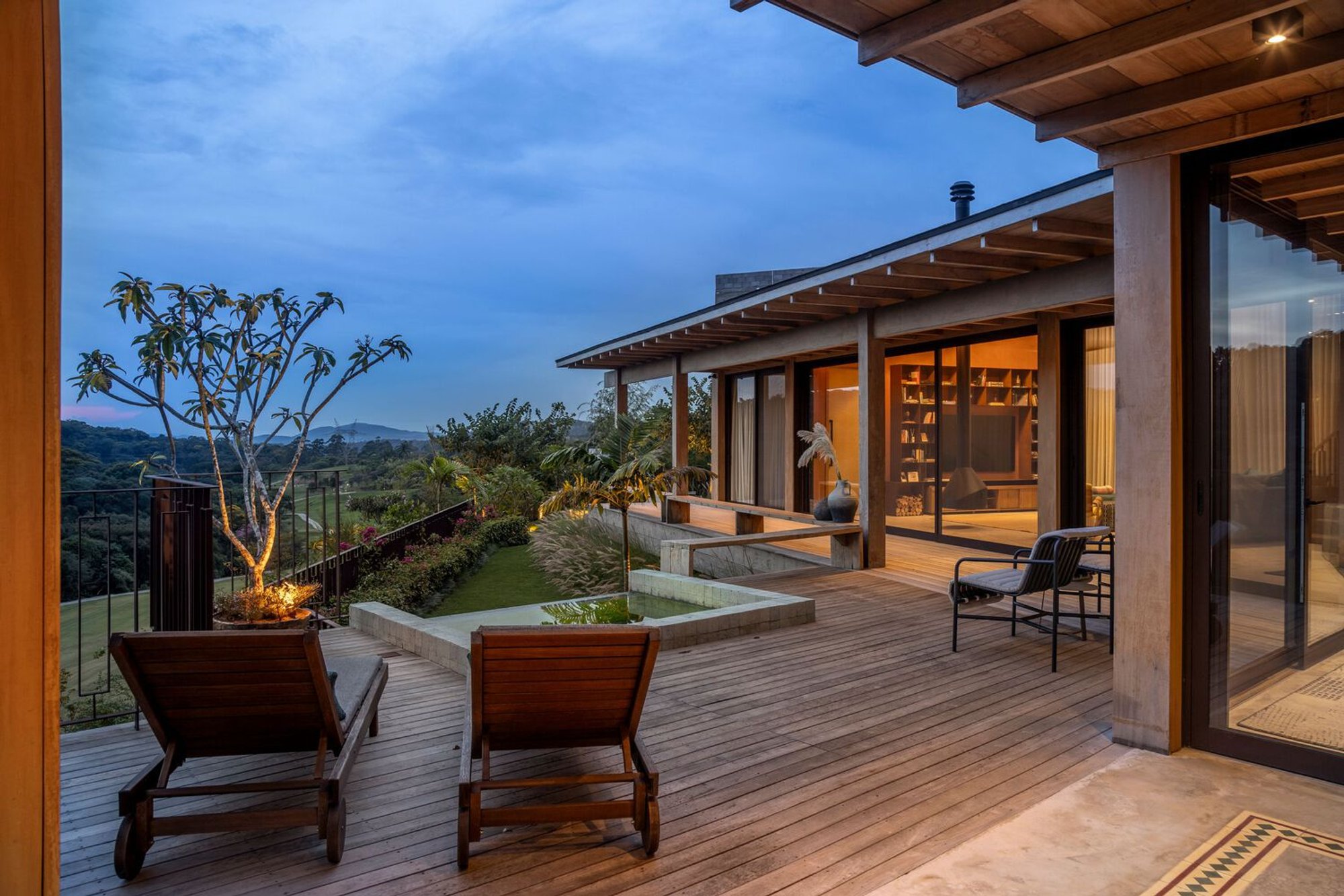 Discovering Sustainable Countryside House Design: Boomerang House in São Roque