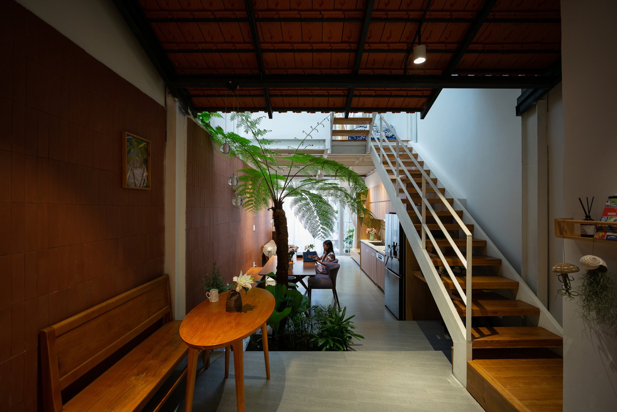 Innovative Family Home Design: Unveiling Nhánh Lan Rừng House by T H I A Architecture