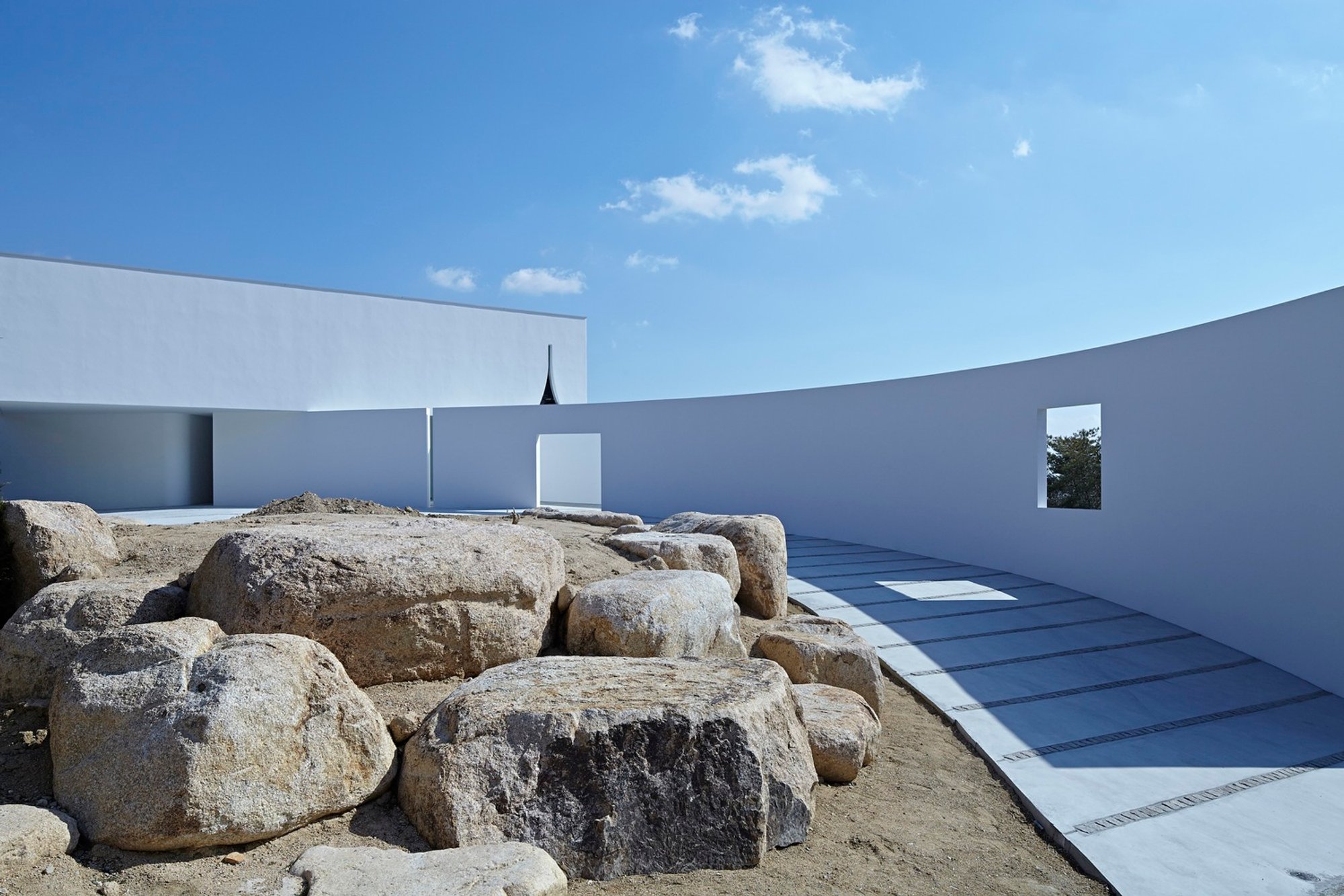 Embracing Minimalist Stone Architecture: The Stone Garden Residence by EASTERN Design Office