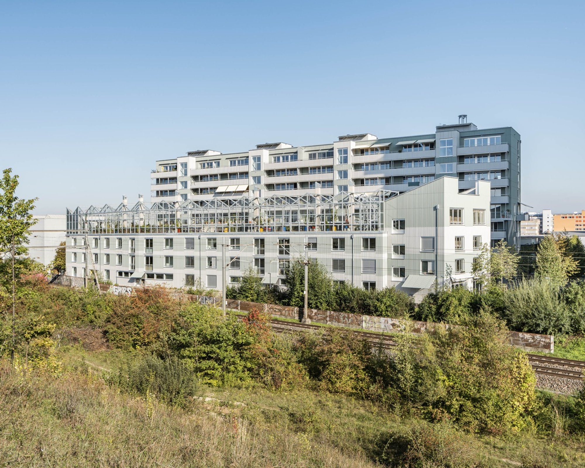 Eco-Friendly Urban Housing: A Deep Dive into Hochbord Housing by Conen Sigl Architekten
