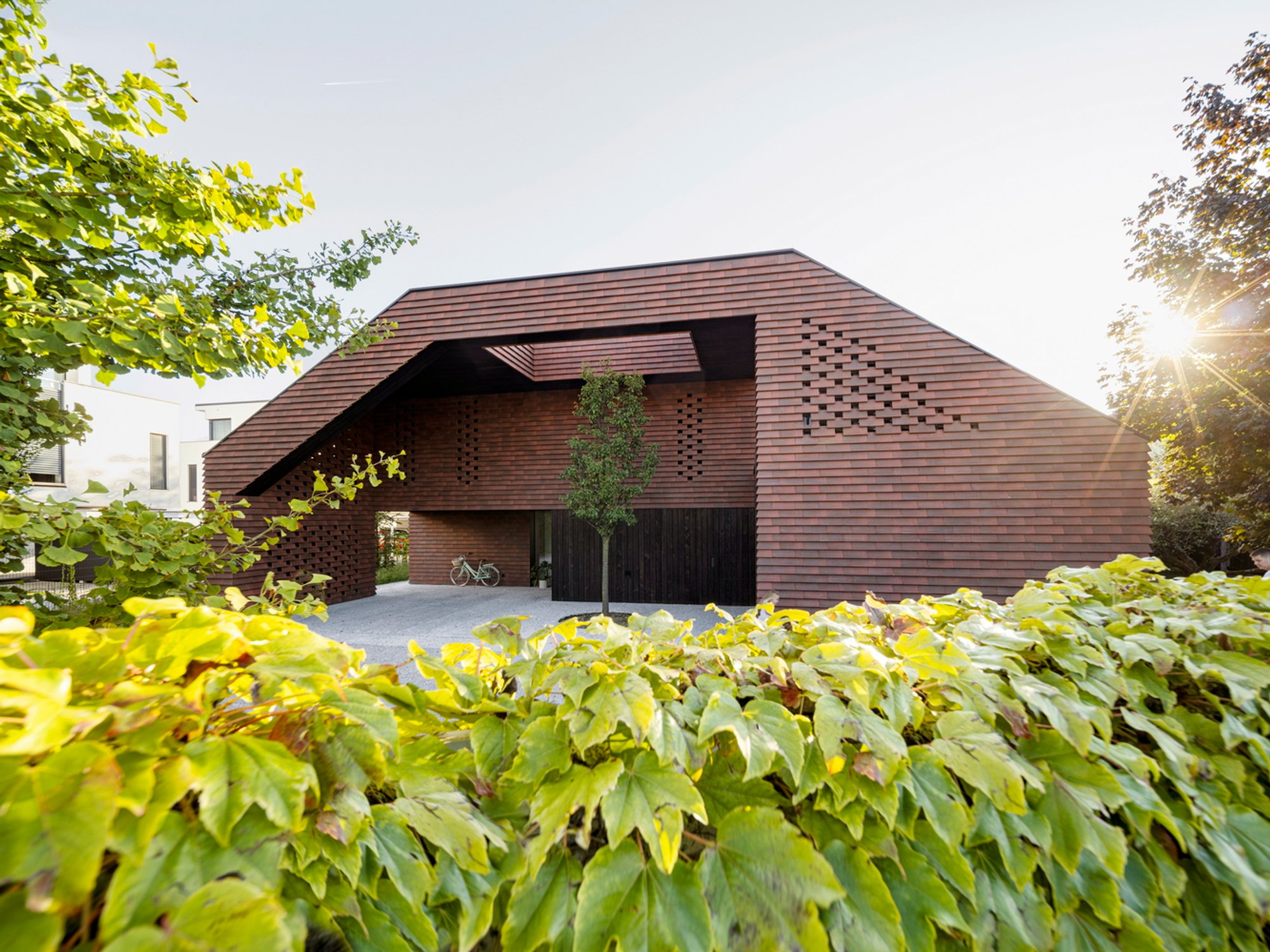 Sustainable Family Home Design: A Deep Dive into Frame House by OFIS Architects