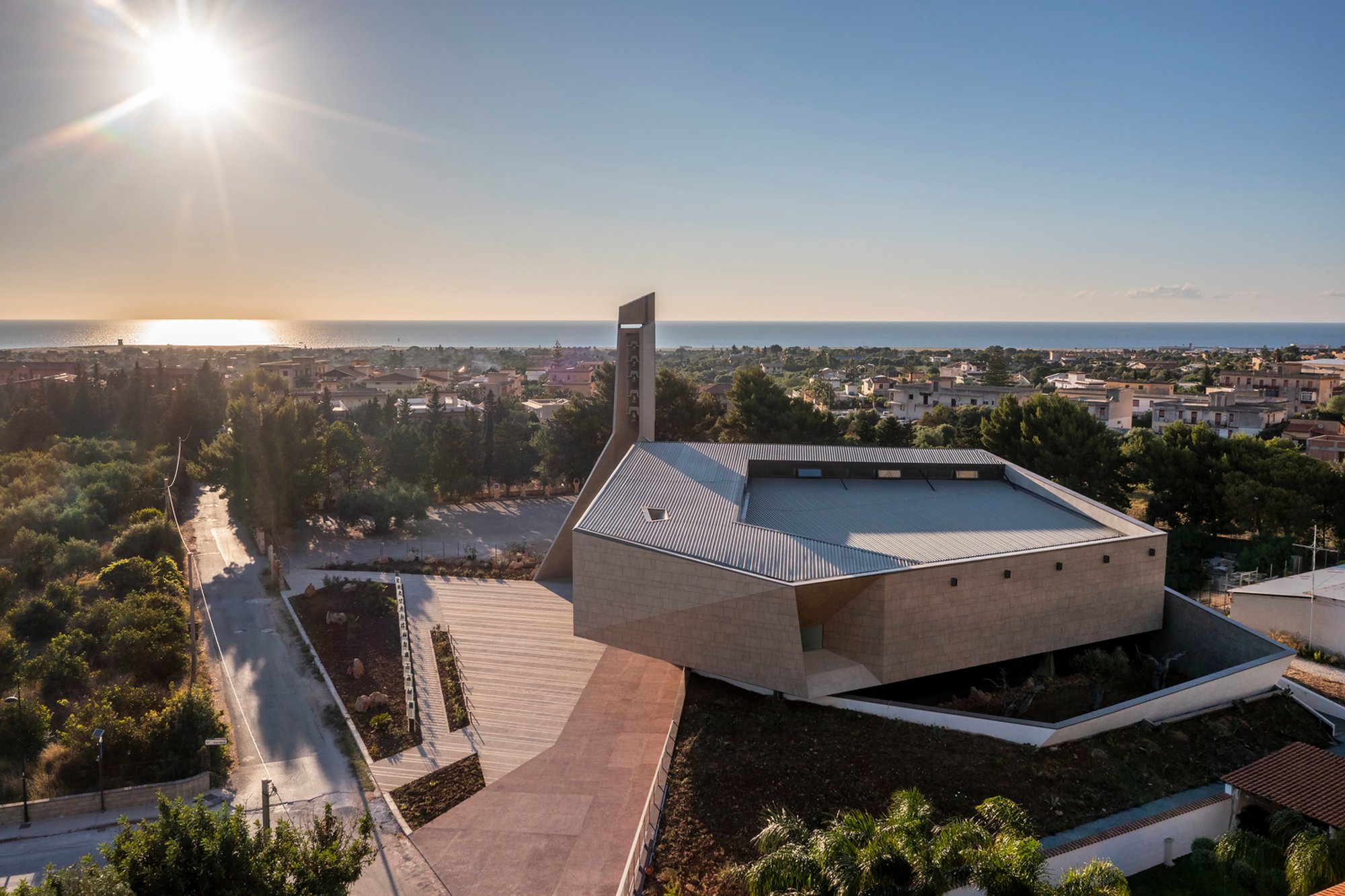 Exploring Modern Church Architecture Through the Lens of Redemptoris Mater by Studio Kuadra