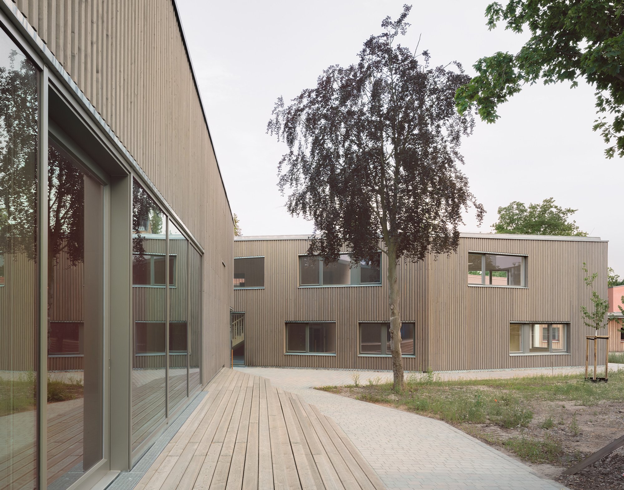 Advancing Sustainable School Architecture: Karl Schubert School's Expansion by Kersten Kopp Architekten