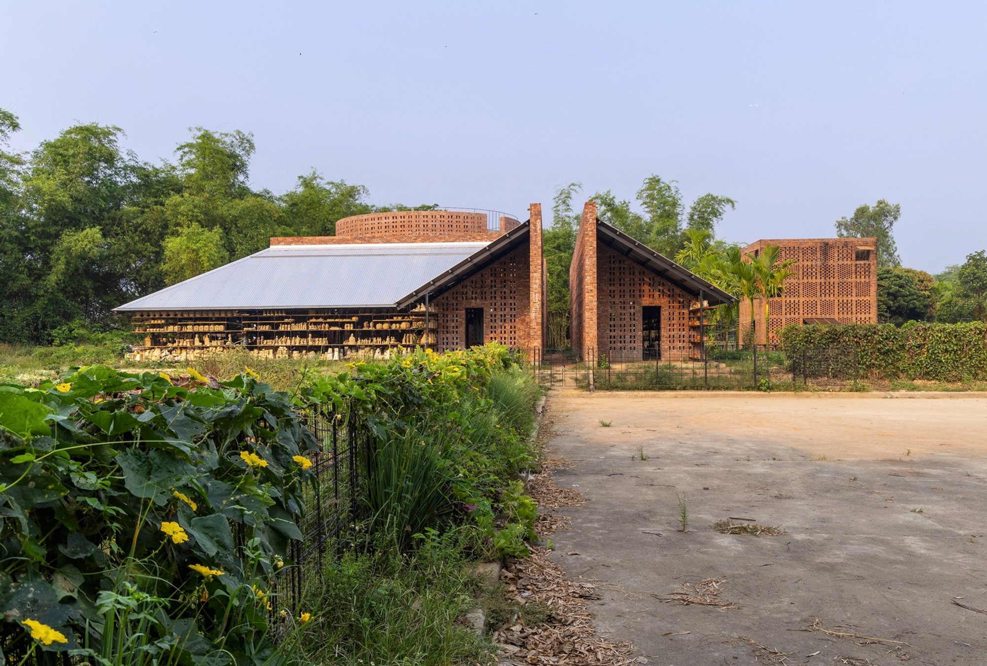 Embracing Sustainable Architecture Design: The Terra Cotta Workshop by Tropical Space
