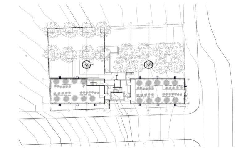 Greenhouse Apartments: Ground-level plan showcasing landscaping, building footprint, and circulation.