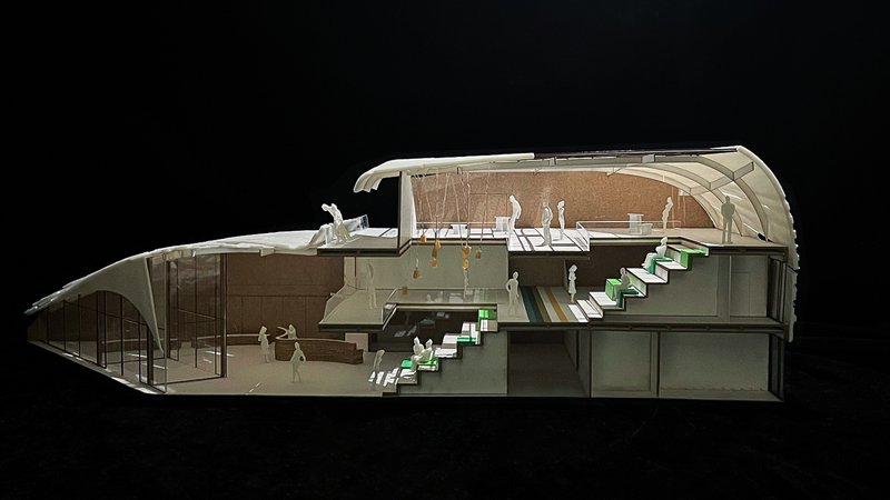 Final Auditorium: Relationship between the lobby and the central garden, integration of three floors through vertical movement