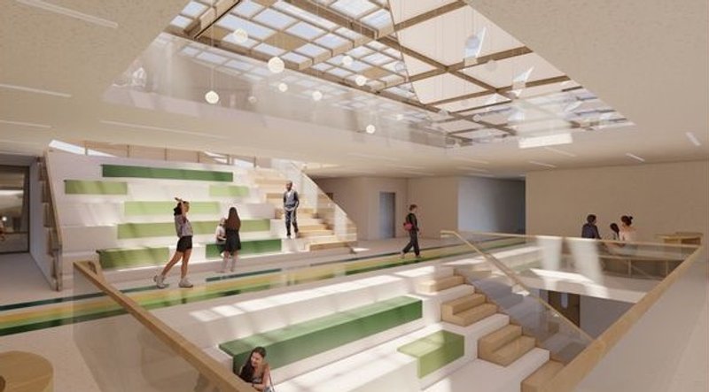 Harmony School's central atrium: light-filled, tiered gathering space.