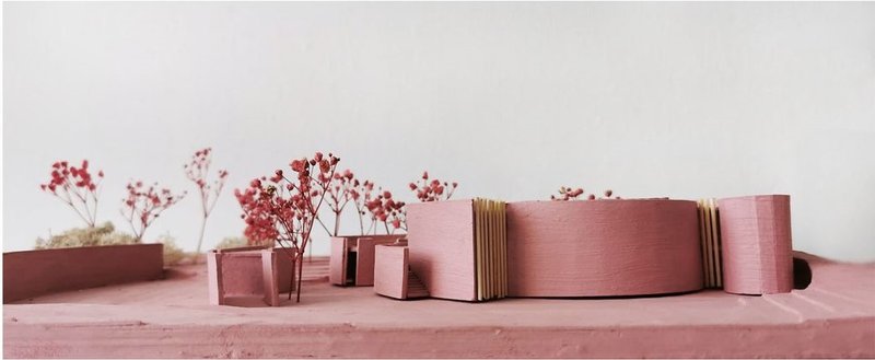 Model showcasing the innovative 'Community Ribbon' project design.