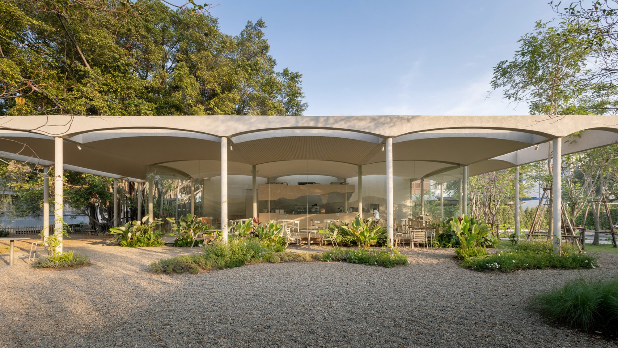 Little Stove & Little Stump Coffee Shop Architecture: A Blend of Imagination and Functionality by NITAPROW