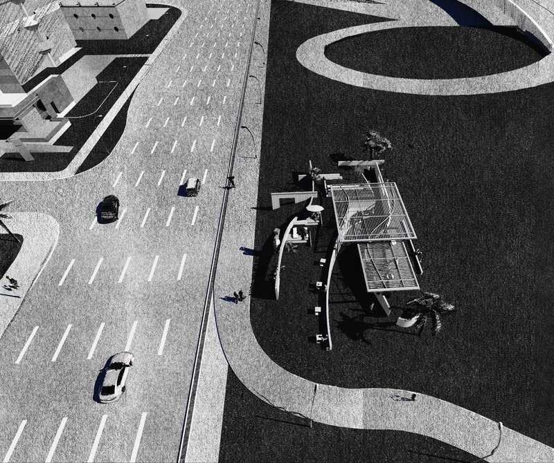 Aerial view of The Wall Coffee, merging city and nature.